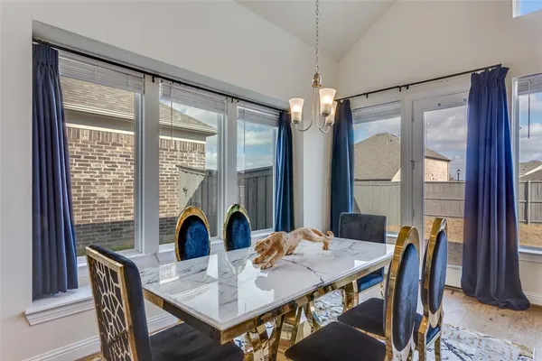 a kitchen with stainless steel appliances granite countertop a refrigerator stove a sink and dishwasher