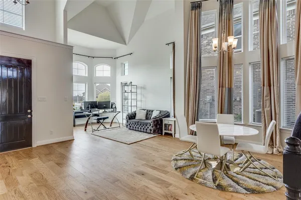 a living room with furniture and a table