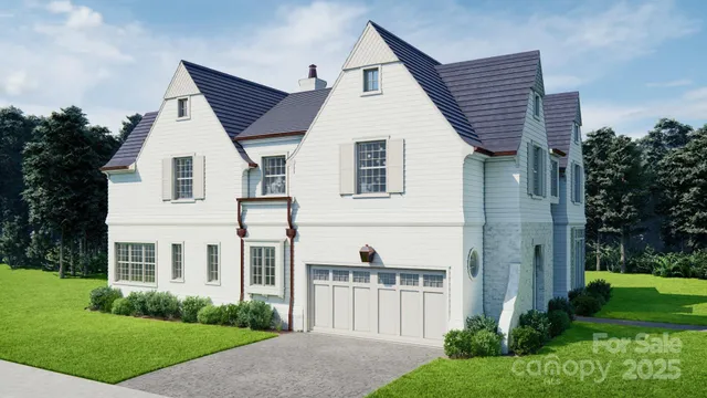 a view of a white house next to a yard