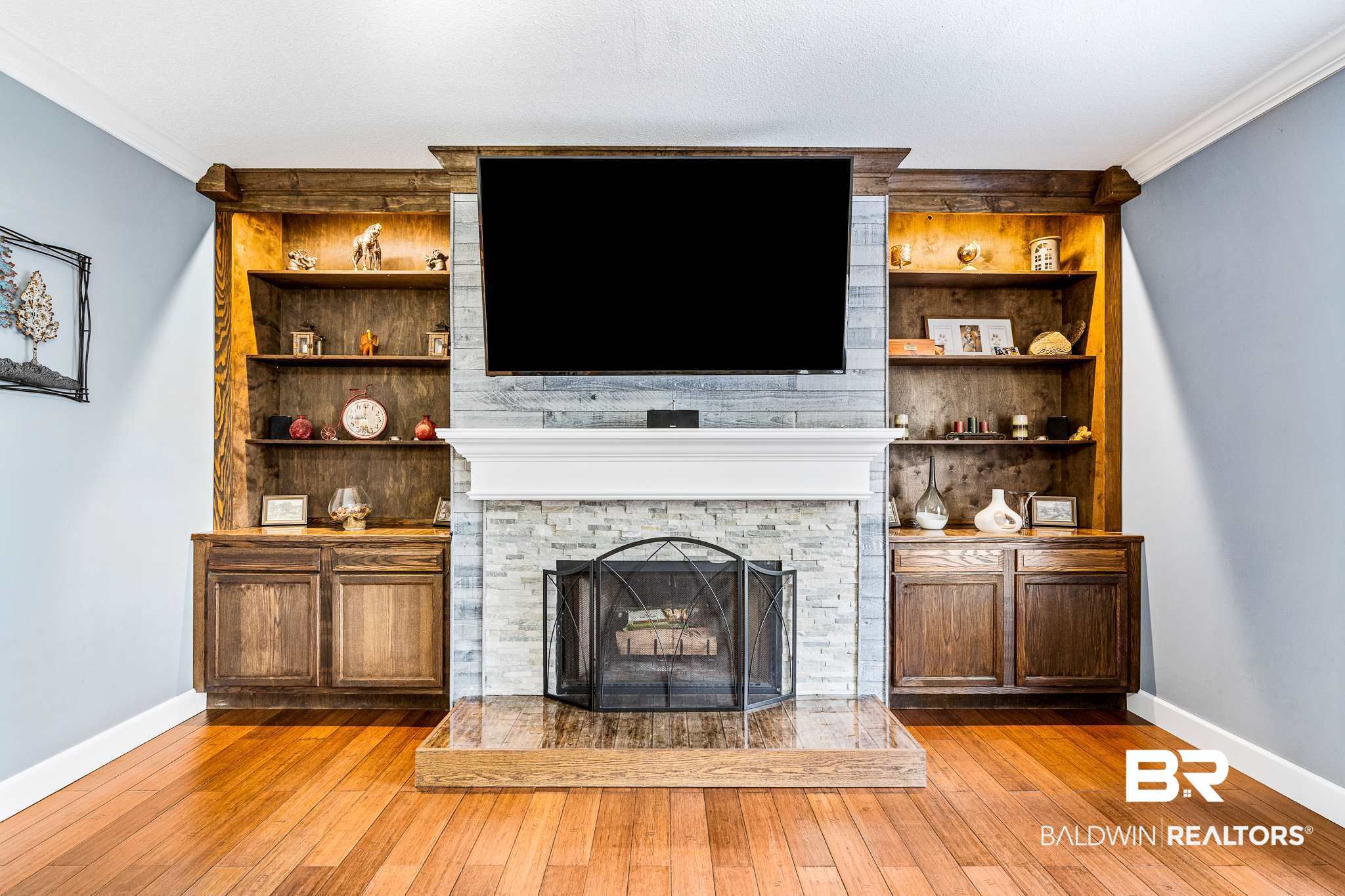 118 Melanie Loop Daphne, AL 36526 - Photo 11 of 25 Living Room with backlit built ins and fireplace