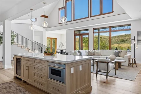 a kitchen with a sink and a window