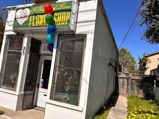 a view of a parked cars on the side of a street