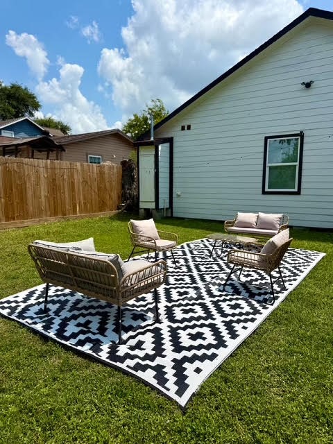 6305 Gay Street Houston, TX 77022 - Photo 12 of 13 a view of a backyard with sitting area