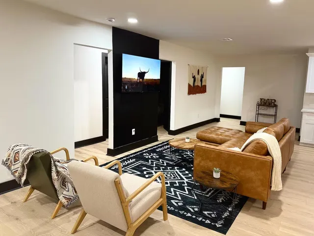 a living room with a couch and a table