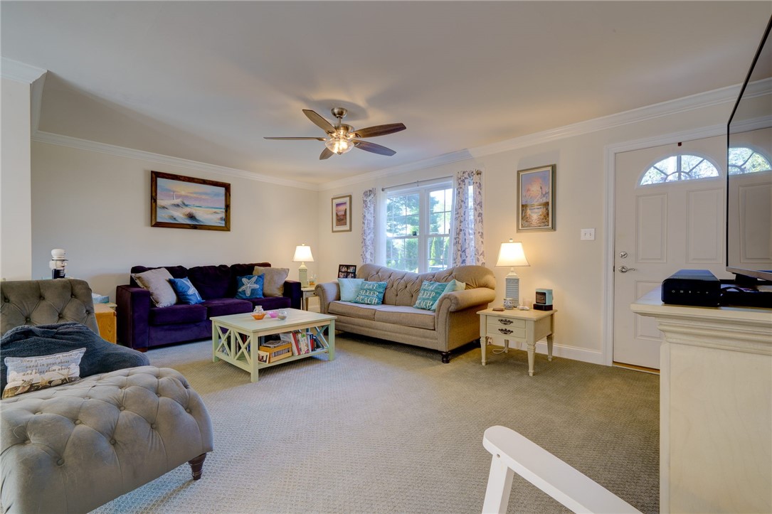 77 Benson Avenue Westerly, RI 02891 - Photo 14 of 42 Living room facing from the kitchen.