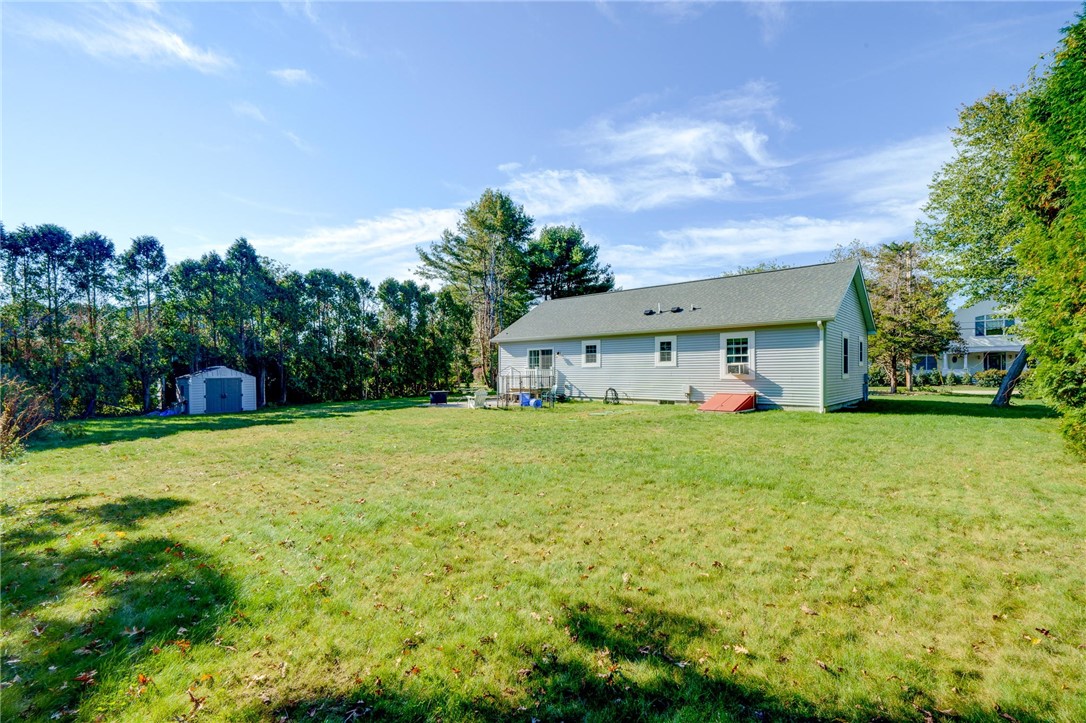 77 Benson Avenue Westerly, RI 02891 - Photo 35 of 42 The back yard. With still much more space to clear if wanted. All level and usable.