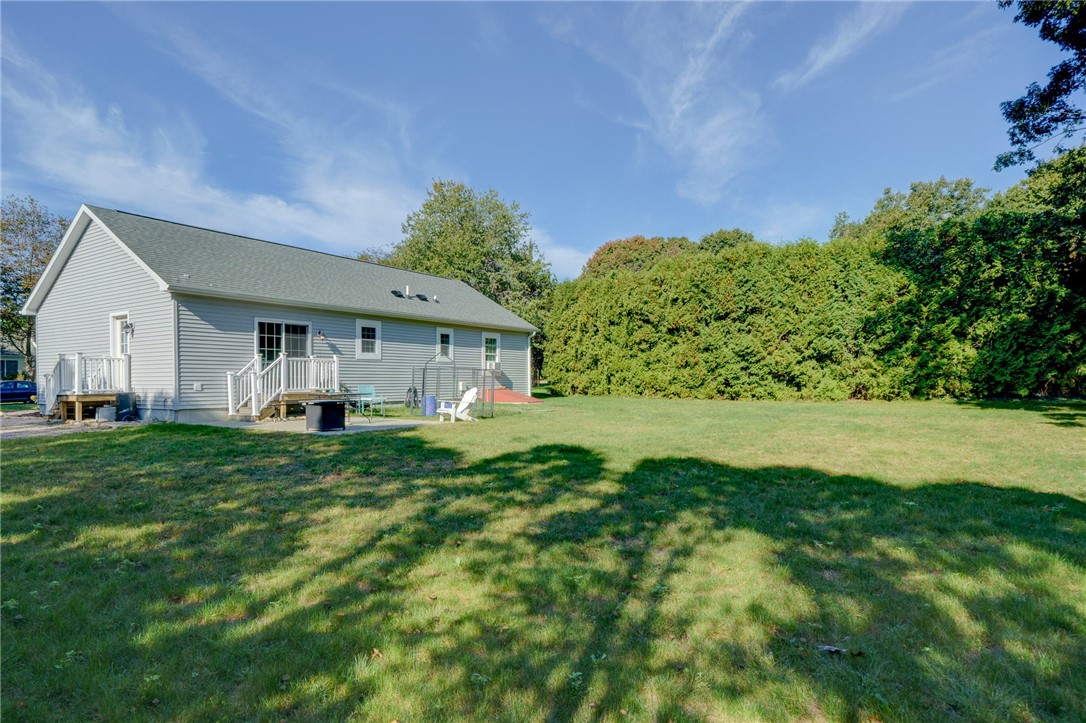 77 Benson Avenue Westerly, RI 02891 - Photo 38 of 42 Maybe a garage with living space? An in-law? Decks and patios?