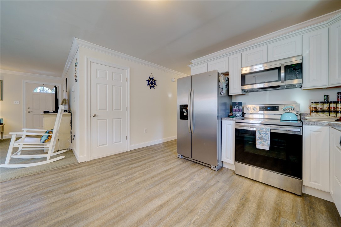 77 Benson Avenue Westerly, RI 02891 - Photo 6 of 42 Fully Equipped Kitchen open to Living room and eating area.