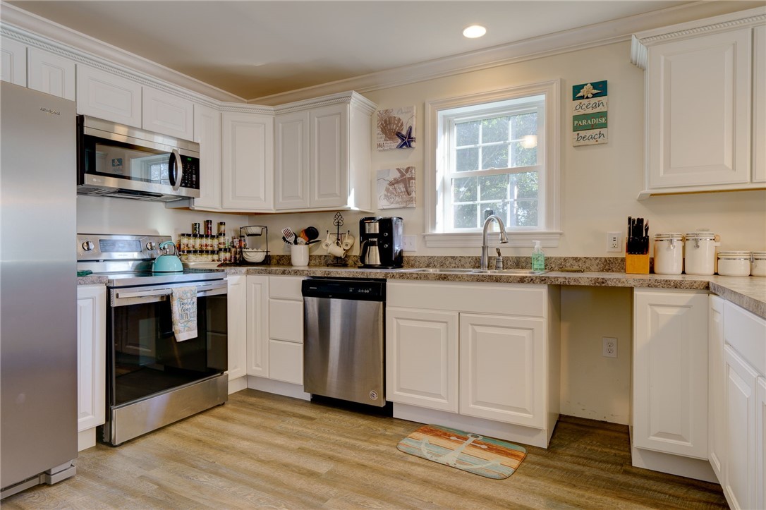 77 Benson Avenue Westerly, RI 02891 - Photo 9 of 42 Fully Equipped Kitchen open to Living room and eating area.