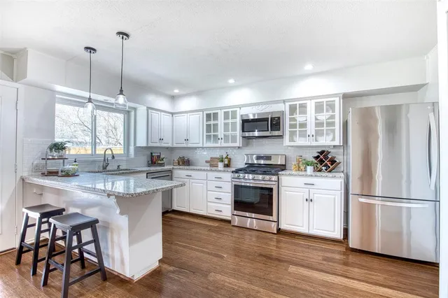 $435,000 | 402 Nottingham Drive, Richardson, TX 75080