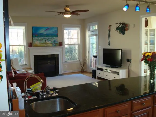 a room with furniture and flat screen tv