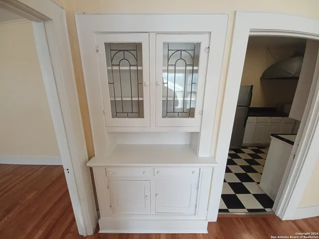 a view of an entryway with wooden floor