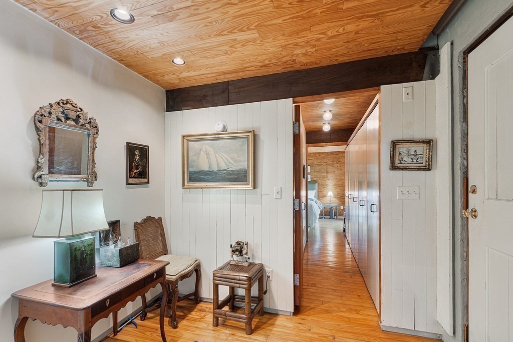 49 Thissell Street Beverly, MA 01915 - Photo 16 of 36 a living room with furniture and wooden floor