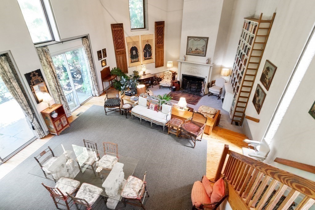 49 Thissell Street Beverly, MA 01915 - Photo 18 of 36 a living room with furniture and a fireplace