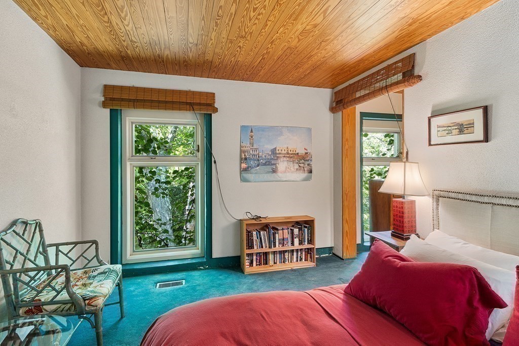 49 Thissell Street Beverly, MA 01915 - Photo 22 of 36 a room with furniture and a window