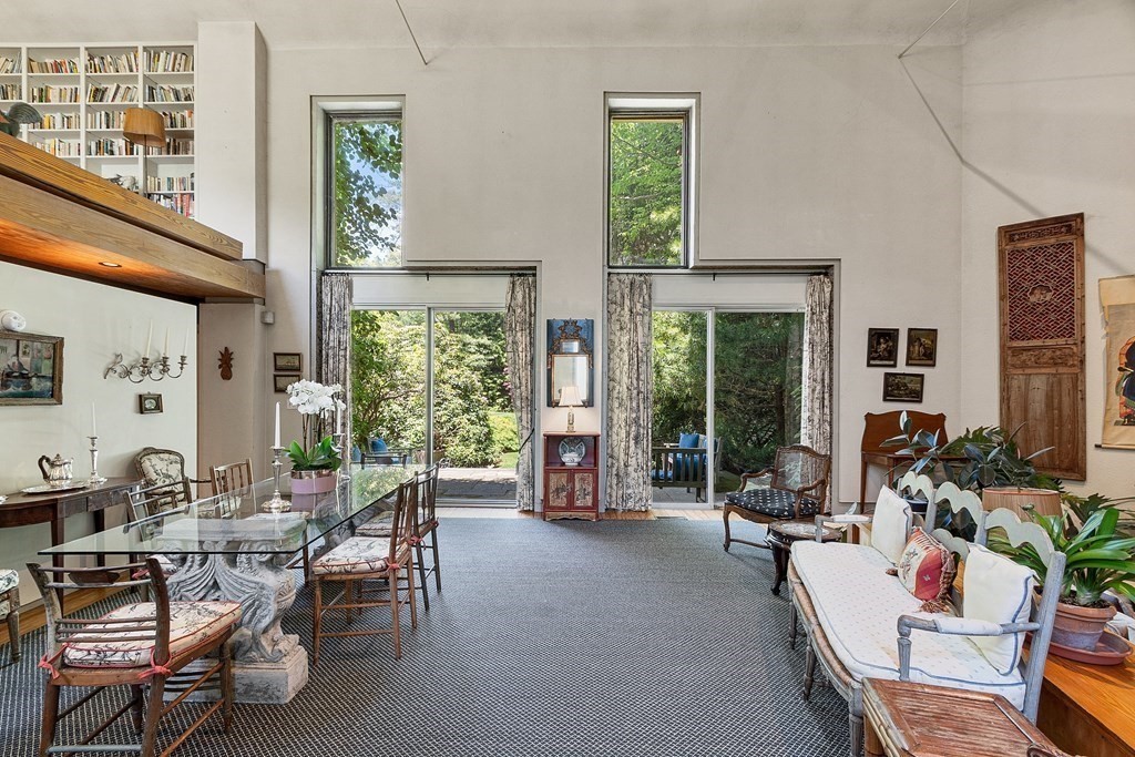 49 Thissell Street Beverly, MA 01915 - Photo 3 of 36 a living room with furniture and a large window