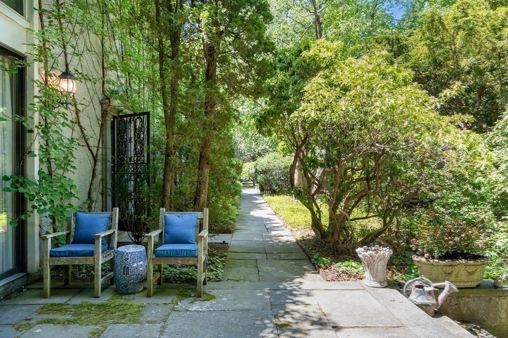 49 Thissell Street Beverly, MA 01915 - Photo 31 of 36 a view of backyard with outdoor seating and green space