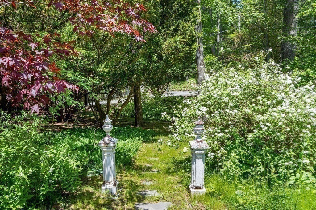 49 Thissell Street Beverly, MA 01915 - Photo 33 of 36 a backyard of a house with lots of green space
