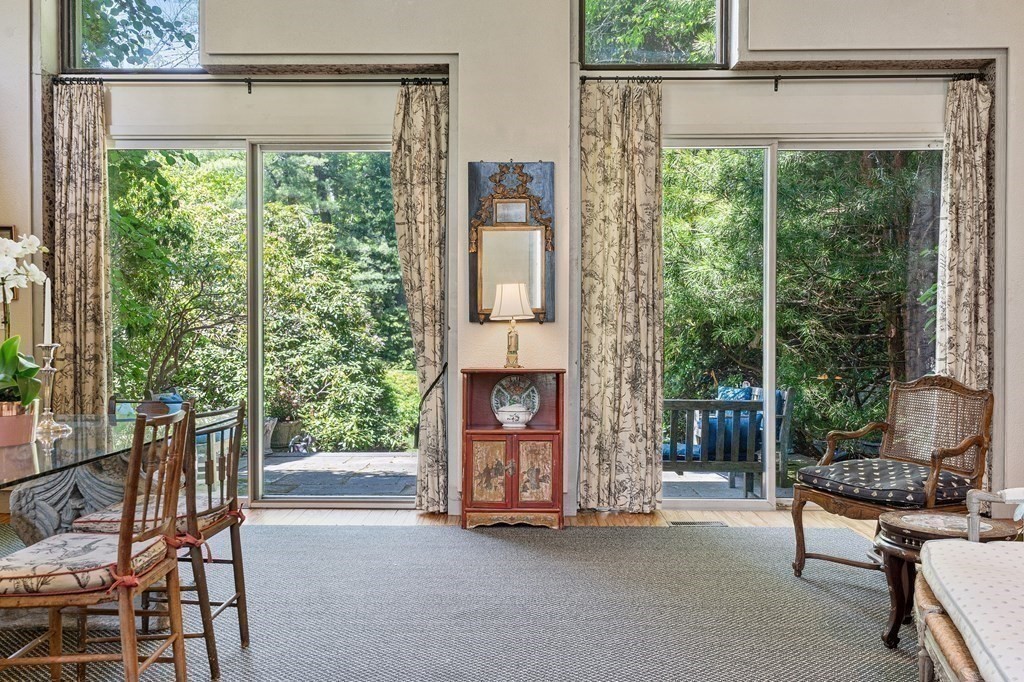 49 Thissell Street Beverly, MA 01915 - Photo 9 of 36 a view of livingroom with furniture and floor to ceiling window