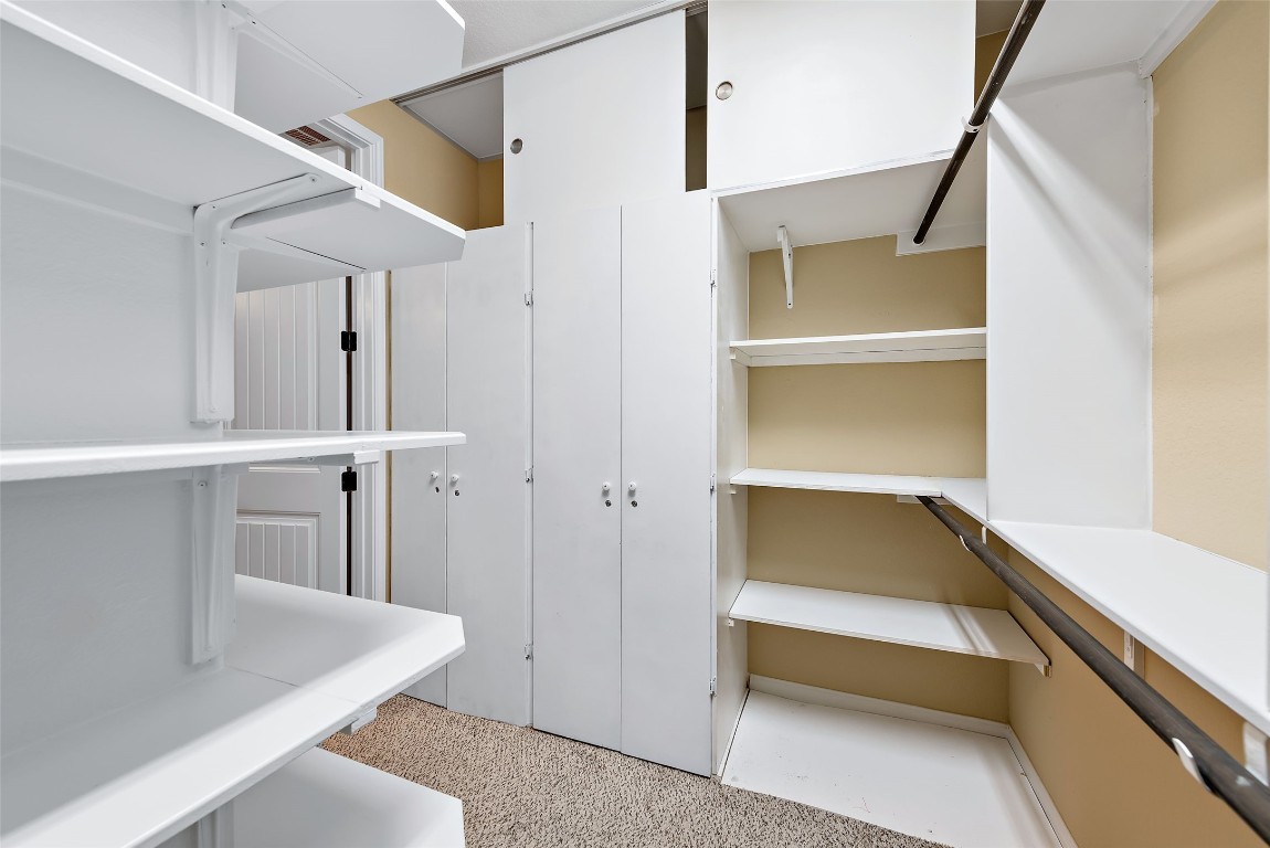 2000 Manada Trail Leander, TX 78641 - Photo 23 of 36 Ample shelving and hanging space defines this highly organized closet system.