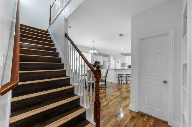 a bathroom with a sink double vanity and a mirror