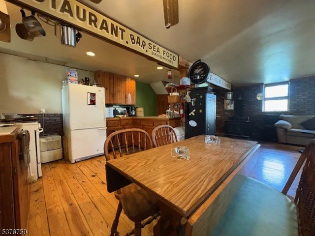 a view of a dining room with furniture