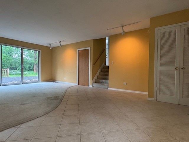 617 Busse Road Mount Prospect, IL 60056 - Photo 4 of 22 a view of an empty room with a window