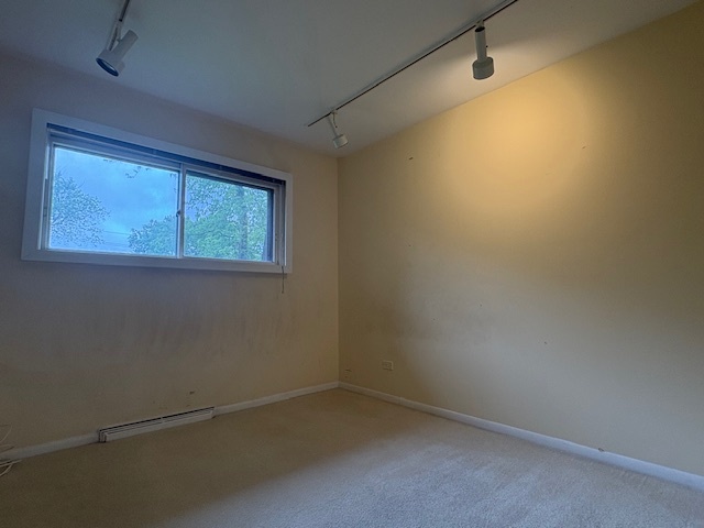 617 Busse Road Mount Prospect, IL 60056 - Photo 9 of 22 an empty room with a window