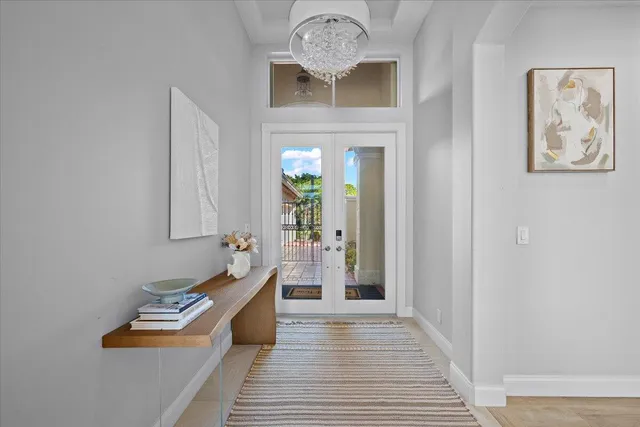 a room with painting and a table