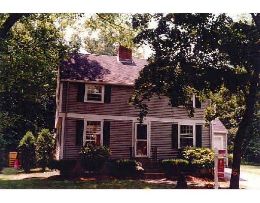 26 Crown Ridge Road Wellesley, MA 02482 - Photo 1 of 1 a view of a house with a garden