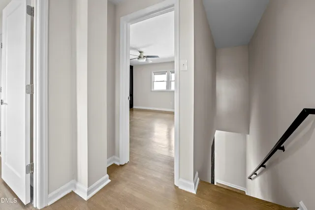 a bathroom with a sink toilet and a mirror