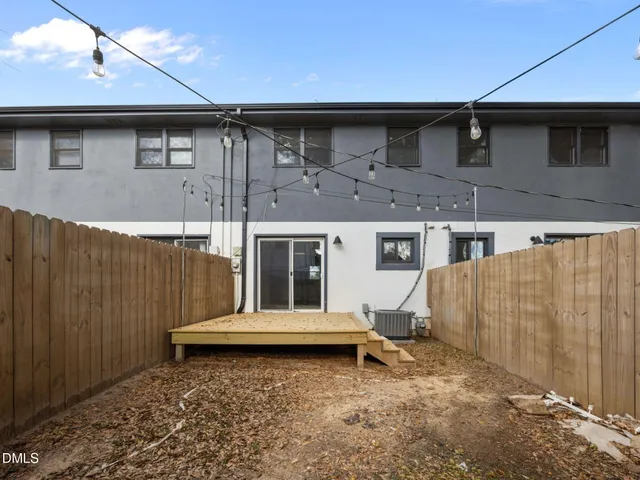 a view of a swimming pool with a lounge chair