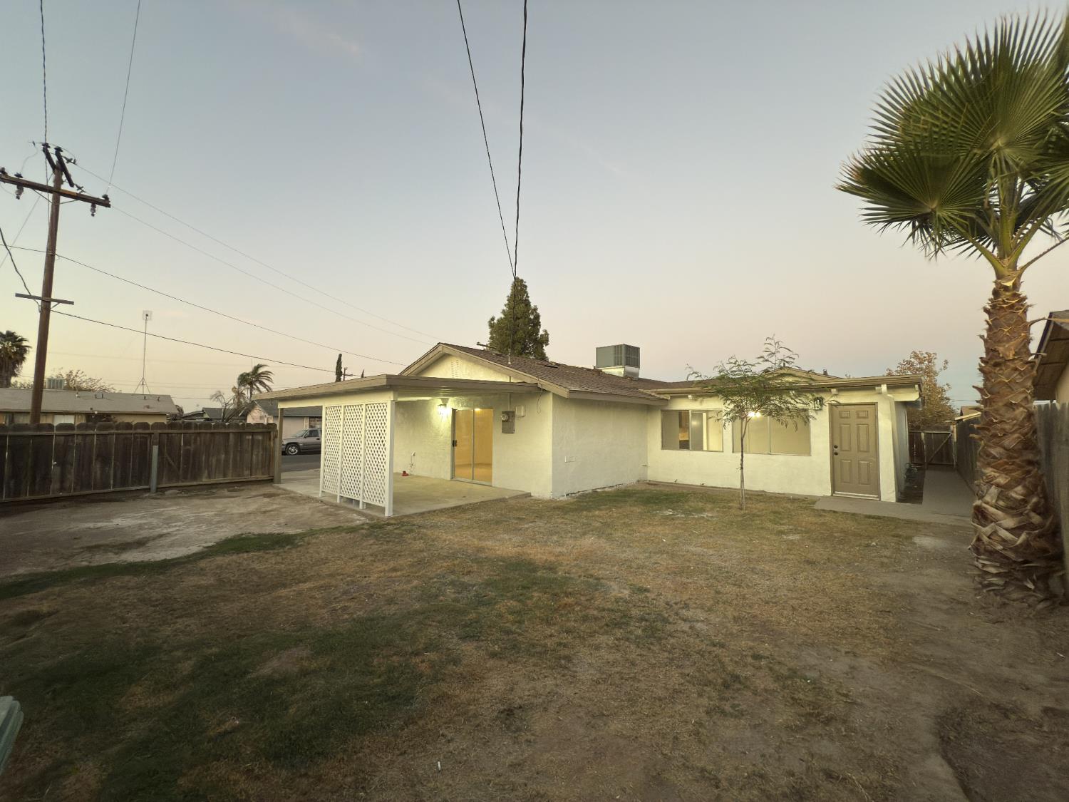 21303 South Wyatt Avenue Riverdale, CA 93656 - Photo 14 of 14 a view of a house with a yard and lake view