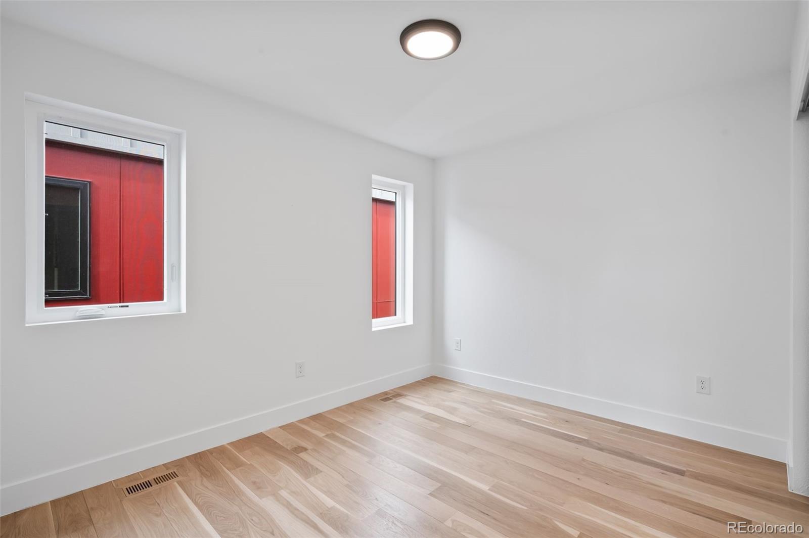 2451 Lawrence Street Denver, CO 80205 - Photo 33 of 48 an empty room with a window