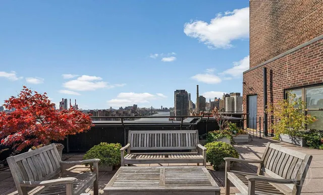 a view of a patio in a backyard