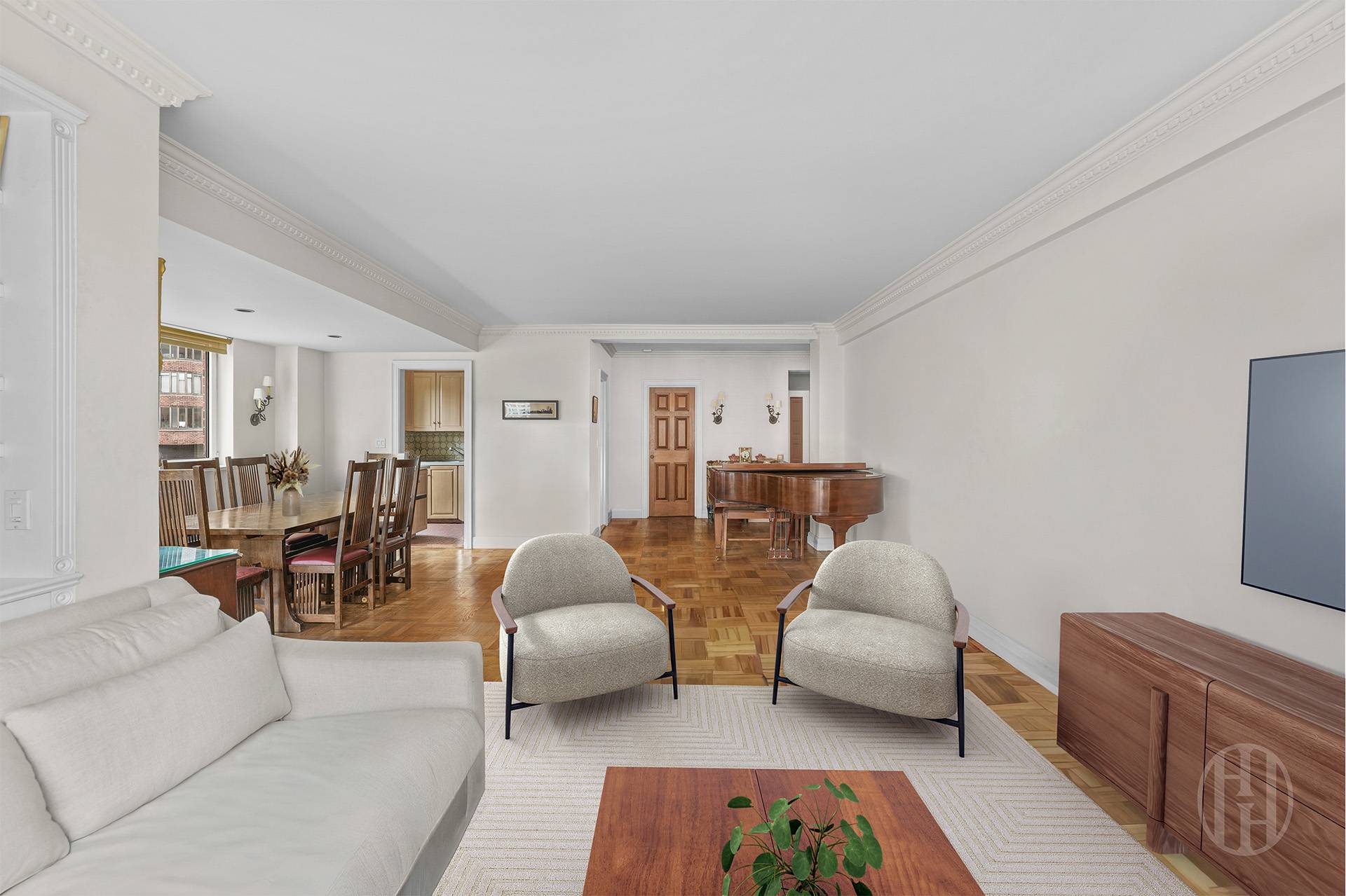 45 East End Avenue, Unit 10F Manhattan, NY 10028 - Photo 3 of 21 a living room with furniture and a couch