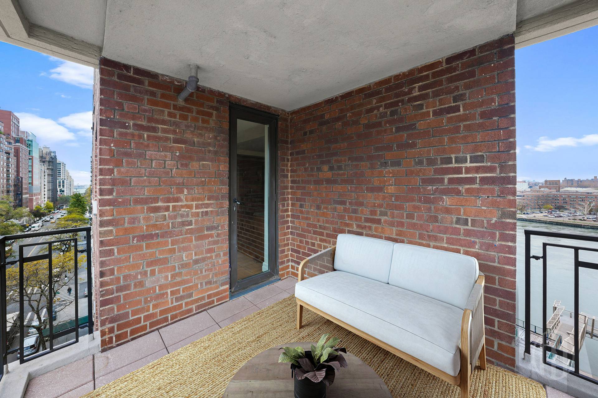 45 East End Avenue, Unit 10F Manhattan, NY 10028 - Photo 6 of 21 a brick building with a bench in front of it