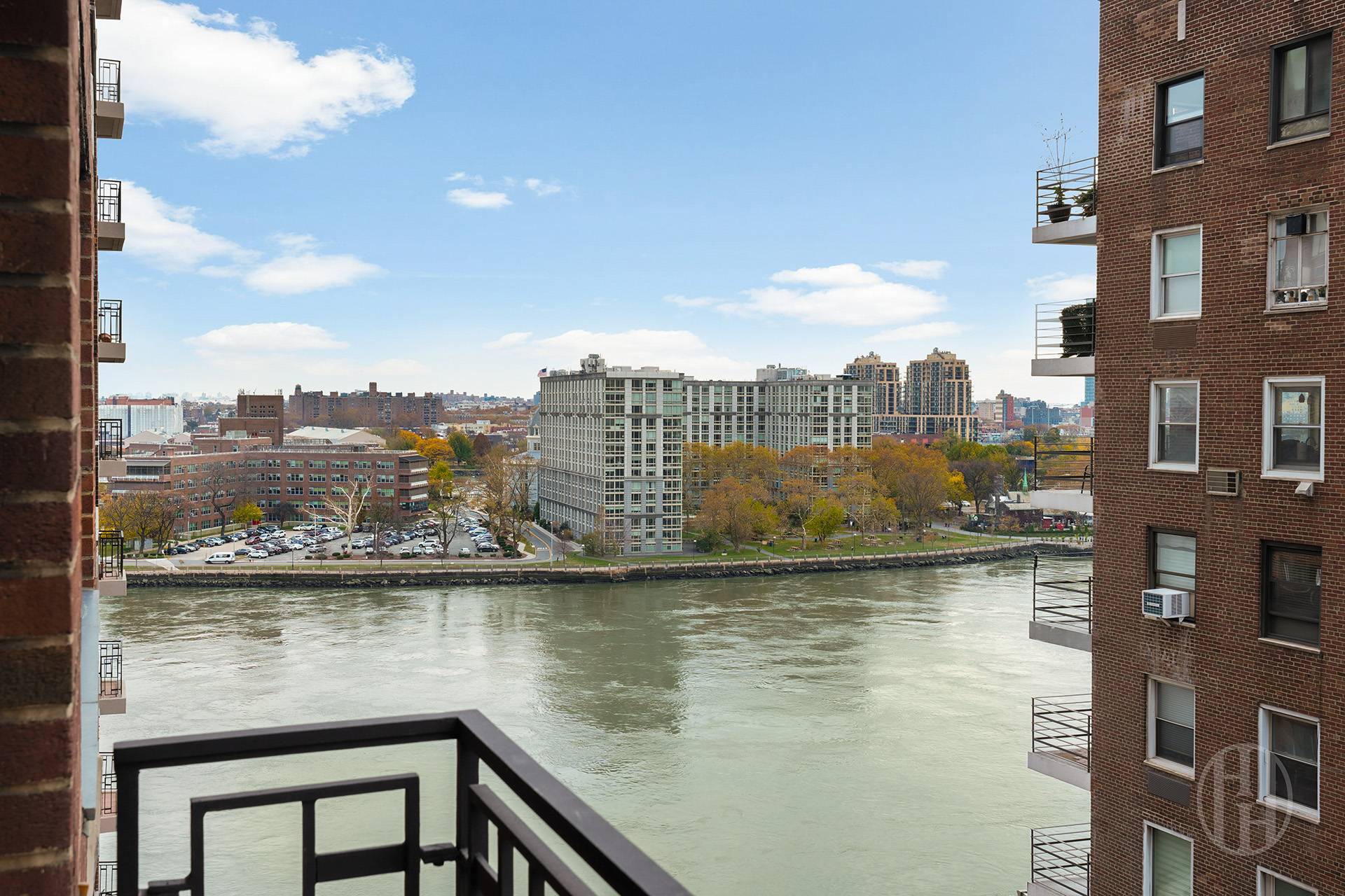 45 East End Avenue, Unit 10F Manhattan, NY 10028 - Photo 7 of 21 a view of a lake with tall building