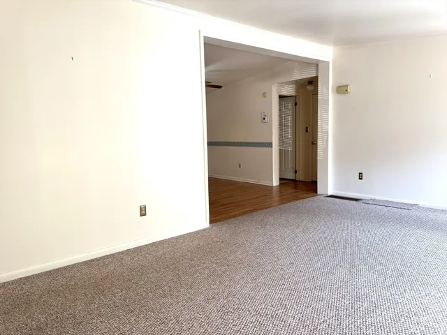 a view of a livingroom with a flat screen tv
