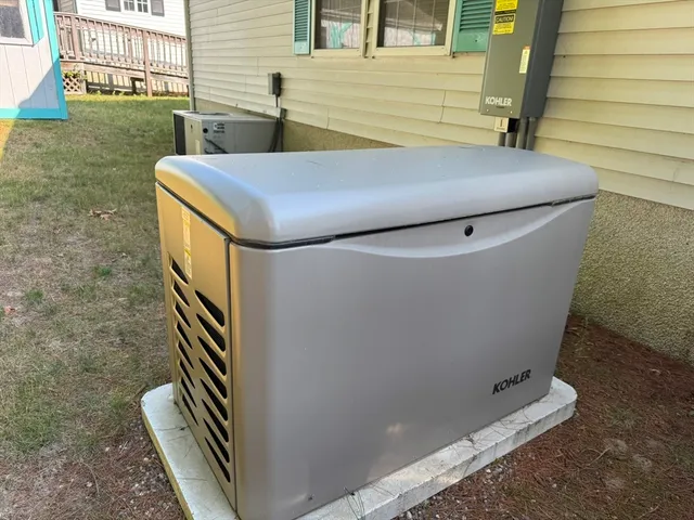 a view of a house with backyard and porch