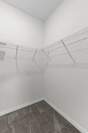 a view of a room with racks on the wall