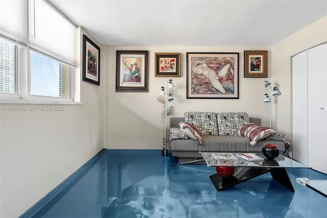 a view of a patio with a table and chairs