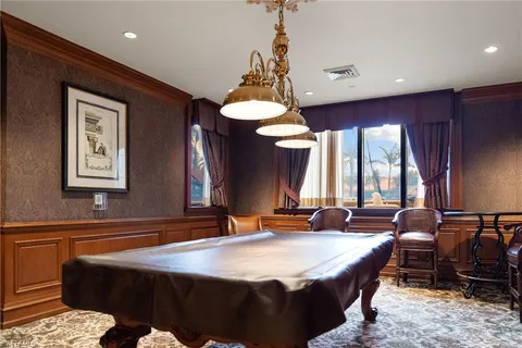 a living room with lots of furniture and white walls