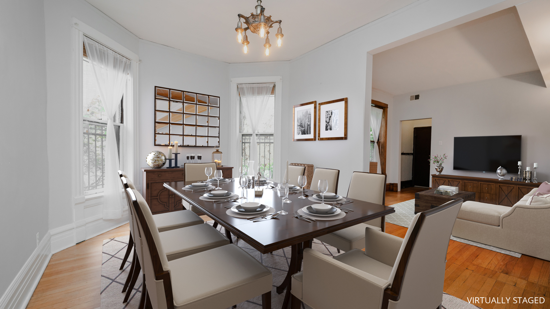 622 West Briar Place, Unit 1 Chicago, IL 60657 - Photo 4 of 20 a view of a dining room with furniture and wooden floor