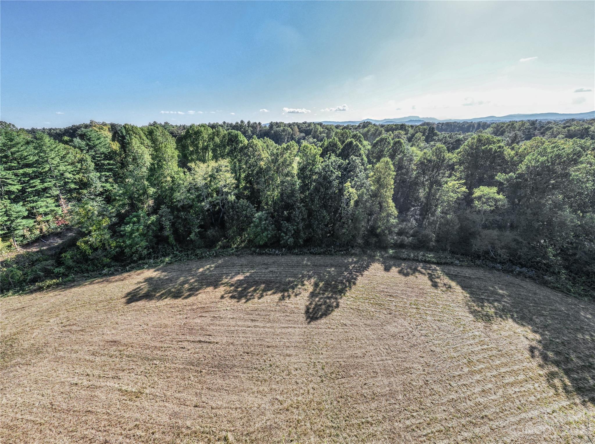 0 Howard Gap Rd Flat Flat Rock, NC 28731 - Photo 9 of 11 a view of a road with mountains in the background