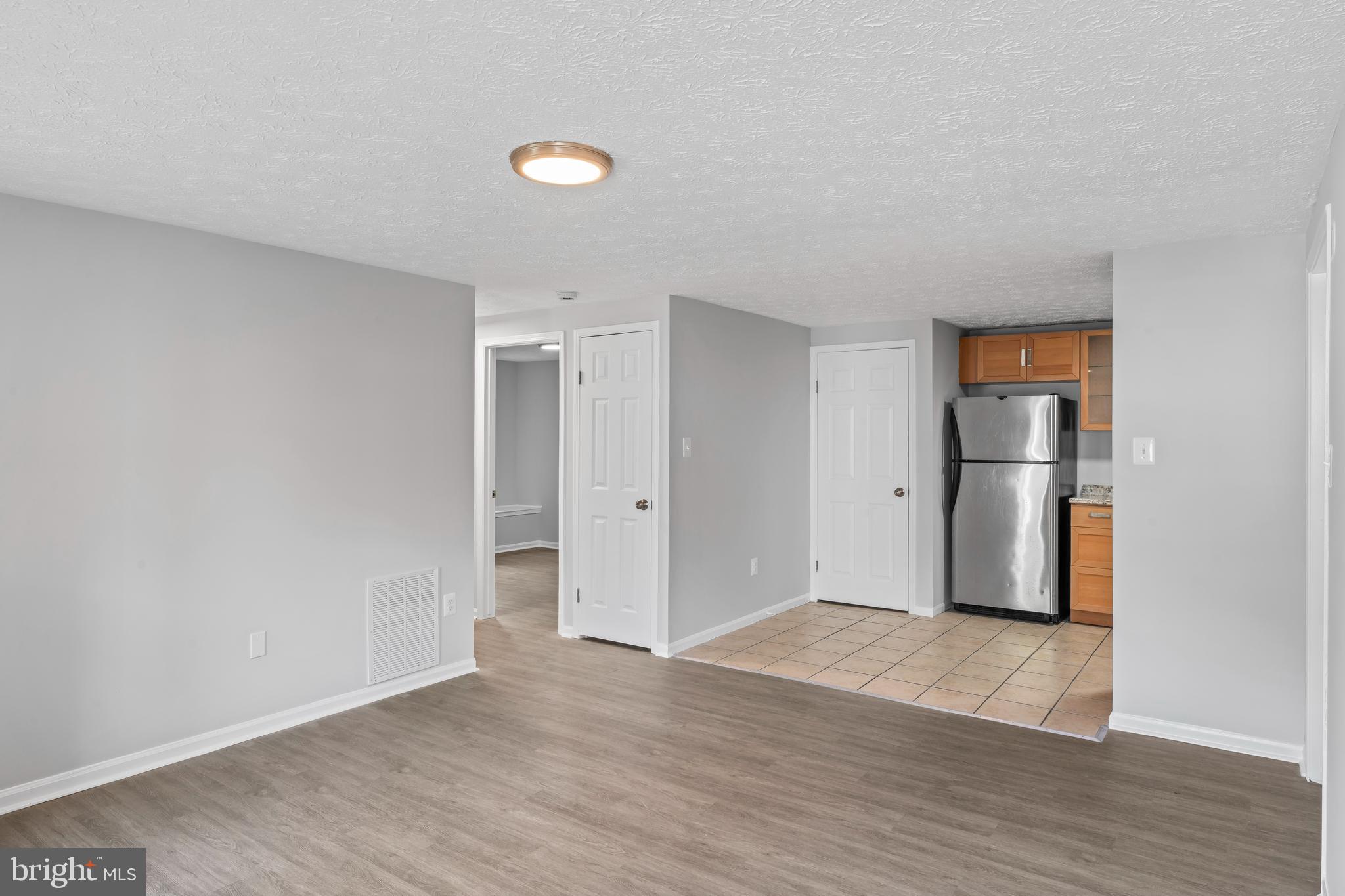 3929 Greencastle Road, Unit 14 Burtonsville, MD 20866 - Photo 12 of 64 Living/Kitchen View 1.