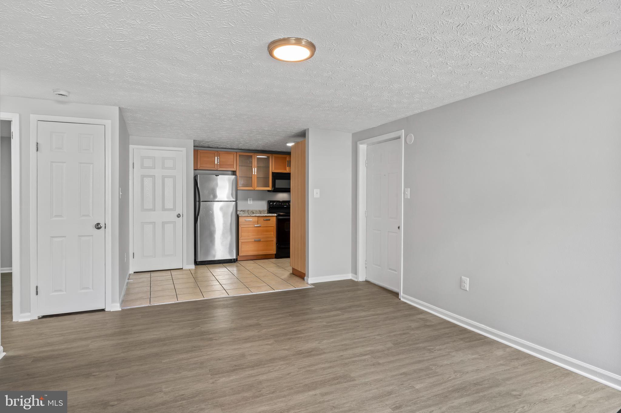3929 Greencastle Road, Unit 14 Burtonsville, MD 20866 - Photo 13 of 64 Living/Kitchen View 2.