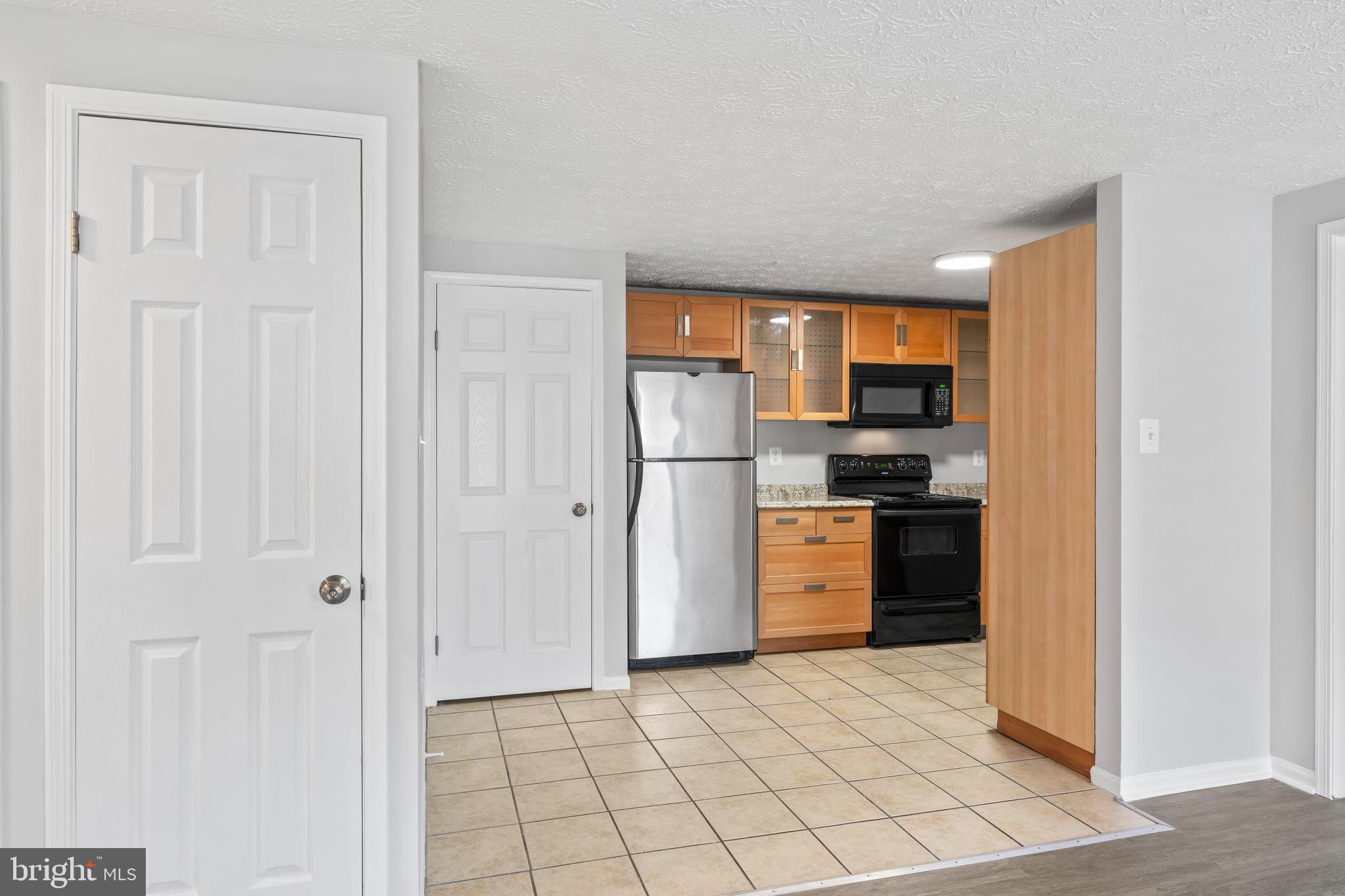 3929 Greencastle Road, Unit 14 Burtonsville, MD 20866 - Photo 21 of 64 Dining/Hall Closet/Kitchen View.
