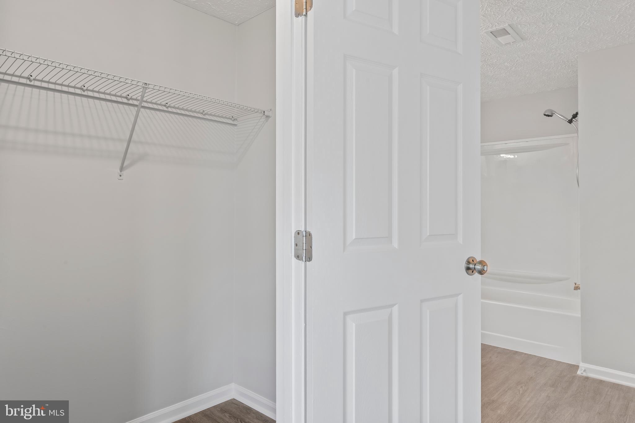 3929 Greencastle Road, Unit 14 Burtonsville, MD 20866 - Photo 38 of 64 Primary Bedroom Walk-in-Closet View 2.