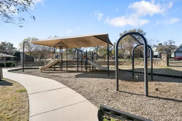 a view of swimming pool with a patio